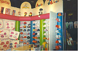 colorful display of hats at Magic Kids in Las Vegas, designed by Manny Stone Decorators