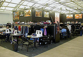 Playboy sales booth with company logos, built by Manny Stone Decorators