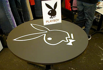 Playboy trade show booth and logo tables by Manny Stone Decorators