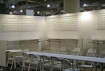 Generic booth with hardwall by Manny Stone Decorators